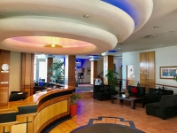 Vacation Hub International | Ocean Breeze Economy Suites Lobby