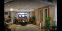  Vacation Hub International | Landmark Suites Lobby