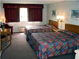 Vacation Hub International | Plantation Oaks Suites & Inn Room