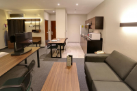  Vacation Hub International | City Express Suites Santa Fe Room