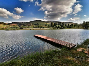  Vacation Hub International | Trout River Falls Room