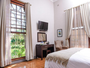  Vacation Hub International | The Sunbird Guesthouse Room