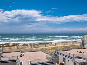  Vacation Hub International | Beach life - Qcean Breeze Unit 55 Room